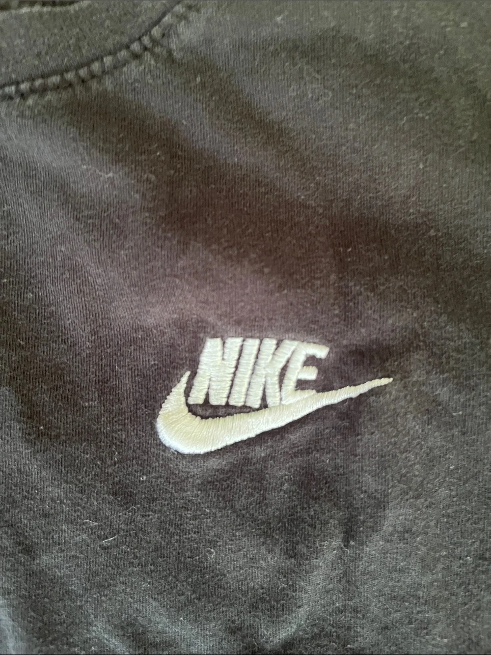 Nike Black T-Shirt with White Swoosh Logo